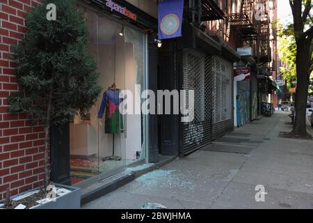 New York, NY, USA - June 1, 2020: Alpana Bawa shop window smashed on Elizabeth Street during New York City looting on the night of June 1, 2020. Stock Photo