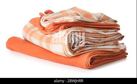 Stack of clean bed sheets on white background Stock Photo