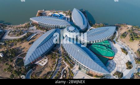 Shanghai, China - January 11, 2018: Aerial view of the flower-shaped Crowne Plaza Shanghai Harbour City, located near Dishui Lake in Shanghai Pudong Stock Photo