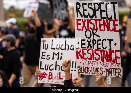 A Black Lives Matter Inland Empire demonstration in the city of Riverside, California, USA in protest of the death of George Floyd a 46 year old Black man, who was killed by Minneapolis police police on May 25th while being arrested. He died after a police officer applied his knee to Mr. Lloyds neck for more than nine minutes, while the suspect was on the ground and handcuffed. Mr. Floyds death has triggered massive protests all across the United States, including here in Riverside. Stock Photo