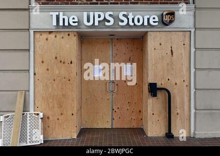 Los Angeles, United States. 01st June, 2020. A UPS Store is boarded up during a protest over the death of George Floyd, Monday, June 1, 2020, in the Westwood neighborhood of Los Angeles. Protests were held in U.S. cities over the death of Floyd, a black man who died after being restrained by Minneapolis police officers on May 25. Photo via Credit: Newscom/Alamy Live News