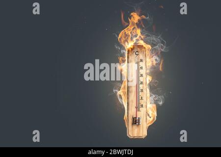 Hot temperature - Thermometer on fire Stock Photo