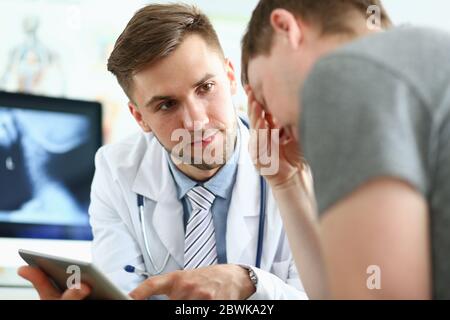 Close up of pleased doctor that examining his patient Stock Photo