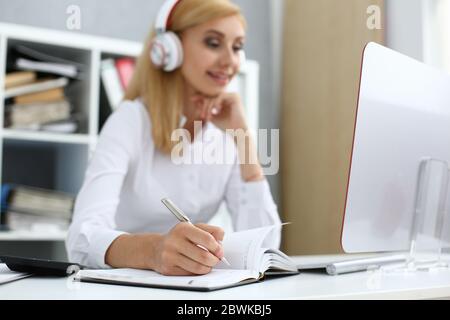 Focused photo on female hand that making notes Stock Photo