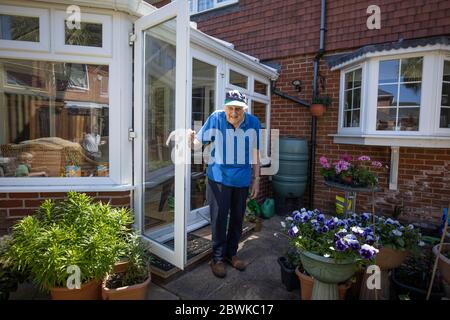 Eighty year old elderly man living at home during the coronavirus lockdown, England, United Kingdom Stock Photo