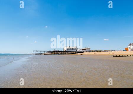 The pier and part sandy part stony shingle beach on the seafront at Bognor Regis, a seaside town in West Sussex, south coast England on a sunny day Stock Photo
