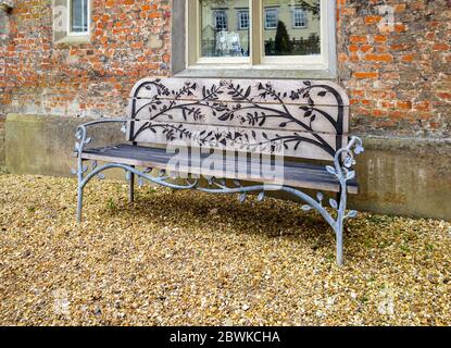 The Jane Austen bench in Abbey Gardens, commissioned for the 200 year anniversary of the writer's death, Winchester, Hampshire, southern England Stock Photo