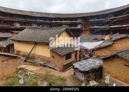 View on the inner structures of a Fujian Tulou (chinese:福建土楼). Traditional houses of the Hakka people. Stock Photo