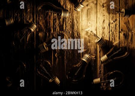 One light bulb turned on and lit, among many others not lit and turned off. 3D Illustration Stock Photo