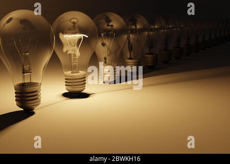 One light bulb turned on and lit, among many others not lit and turned off. 3D Illustration Stock Photo