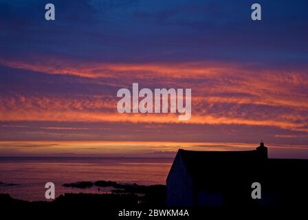 Sunset over Irish Sea from Kearney Village, Northern Ireland Stock Photo