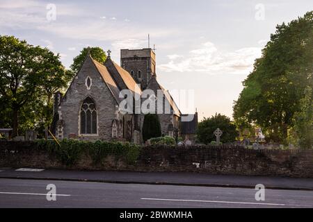 Bristol, England, UK - April 30, 2020: Evening sun shines on the traditional parish church of St Michael the Archangel on Two Mile Hill in Kingswood, Stock Photo