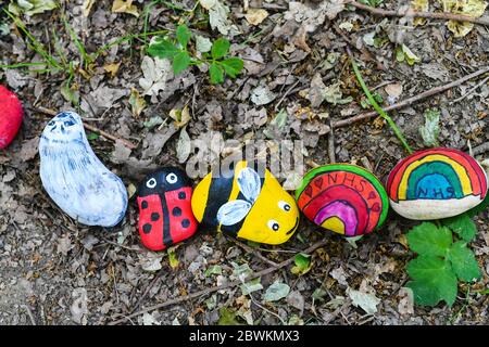 Hand painted NHS stones anti covid 19 Stock Photo
