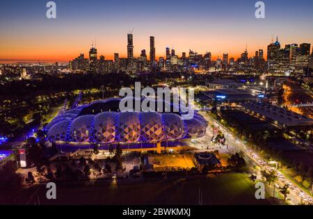 Melbourne Australia May 15th 2020 : Aerial night view of AAMI stadium and the city of Melbourne at sunset Stock Photo