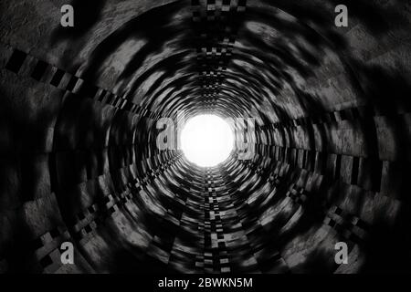 3d rendering of wet dark tunnel with light at the end of tunnel Stock Photo