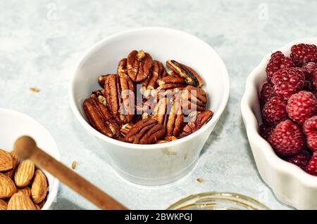 Peeled pecan nuts isolated on white background Stock Photo