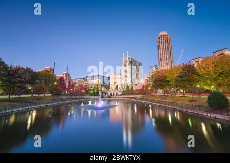 Atlanta, Georgia, USA city skyline from Atlantic Station at dusk with autumn foliage. Stock Photo