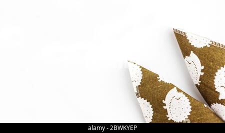 Easter ears from a green napkin for table setting Stock Photo