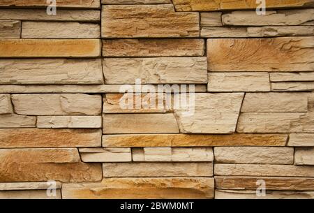 Horizontal yellow modern brick wall for pattern and background Stock Photo