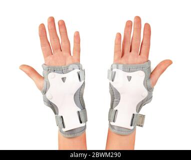 Roller skater wearing wards guards protector pads, wrist protection on hands woman isolated white background Stock Photo
