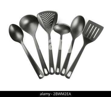 Black plastic kitchen cooking utensils isolated on white Stock Photo