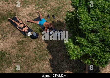 London, UK. 2nd June, 2020. Coronavirus: Sunbathing in Hyde Park. Currently sunbathing, exercising, and outdoor sports are all encouraged under the current lockdown ease, as long as social distancing is employed and is only done with a maximum of one other person from another household. Credit: Guy Corbishley/Alamy Live News Stock Photo