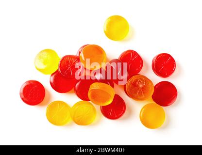 Colorful fruit hard candy isolated on white background top view Stock Photo