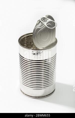 Empty tin can isolated on a white background. Metallic Food container Stock Photo