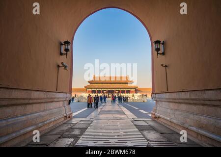 BEIJING, CHINA - NOVEMBER 28: View of the Forbidden City palace, framed through an entrance gate on November 28, 2019 in Beijing Stock Photo