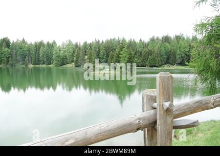 Tret lake in the Northern Italy in Italian valley of Val Di Non. Stock Photo