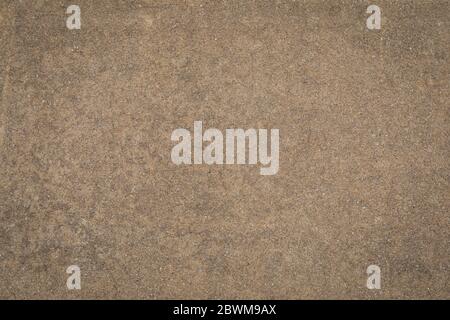 Background vignette in dark tan khaki brown concrete texture, creative copy space, horizontal aspect Stock Photo