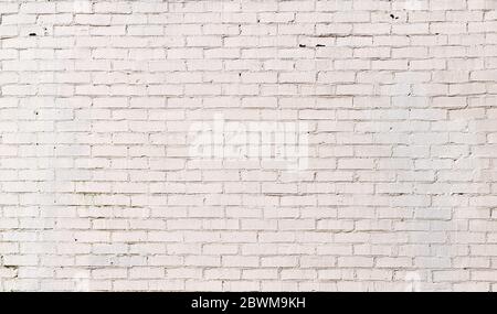 Brick wall painted white, smooth brick with textured mortar, subtle panoramic background pattern for text, horizontal aspect Stock Photo