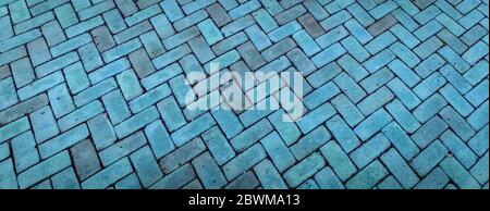 Panoramic backdrop in brick herringbone pattern in luminous blue shades, creative copy space, horizontal aspect Stock Photo