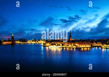 Stockholm, Sweden. Aerial view of Gamla Stan in Stockholm, Sweden with landmarks like Riddarholm Church during the sunrise. View of old buildings and Stock Photo