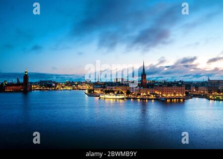 Stockholm, Sweden. Aerial view of Gamla Stan in Stockholm, Sweden with landmarks like Riddarholm Church during the sunrise. View of old buildings and Stock Photo
