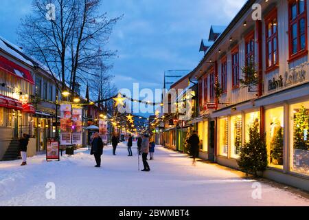LILLEHAMMER, NORWAY - DECEMBER 26, 2019: View of old historical buildings in the center of Lillehammer, Norway during a snowy winter night Stock Photo