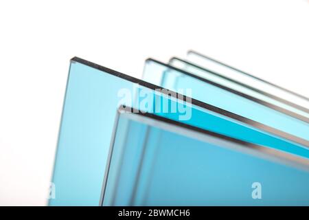Sheets of Factory manufacturing tempered clear float glass panels cut to size Stock Photo