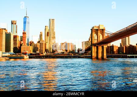 New York, USA. View of Manhattan bridge and Manhattan in New York, USA in the morning. Clear blue sky with skyscrapers Stock Photo
