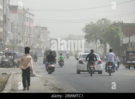 Beawar, Rajasthan, India - June 2, 2020: Commuters pass through a dust storm, in Beawar. Credit: Sumit Saraswat/Alamy Live News Stock Photo