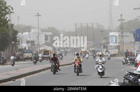 Beawar, Rajasthan, India - June 2, 2020: Commuters pass through a dust storm, in Beawar. Credit: Sumit Saraswat/Alamy Live News Stock Photo