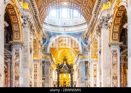 VATICAN CITY - MAY 07, 2019: Ray of light in interior of the Saint Peters Basilica, Vatican in Rome, Italy. Stock Photo