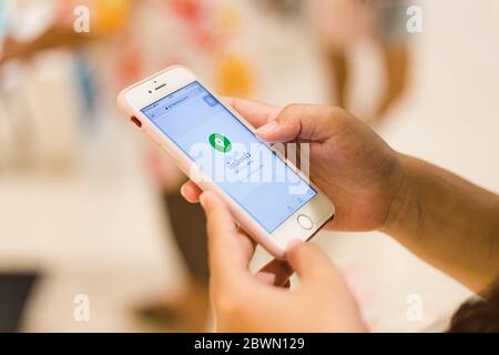 ‘Thai Chana’ mobile phone online platform for shop visitor Check-in when go shopping at supermarket, new Coronavirus(COVID-19) control measures from T Stock Photo