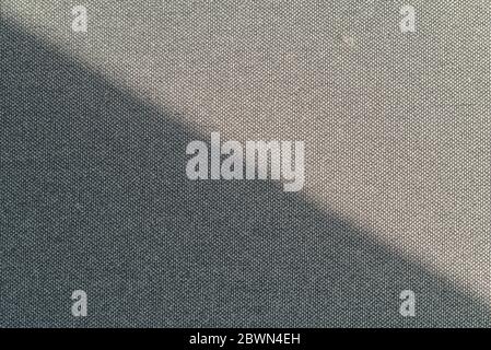 Closeup  grey fabric texture. Fabric pattern design or upholstery abstract background closeup. Stock Photo