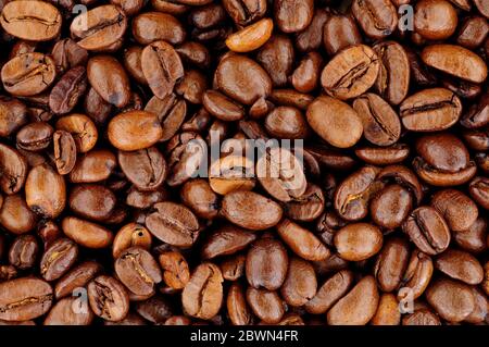Aromatic fresh roasted coffee bean background texture Stock Photo