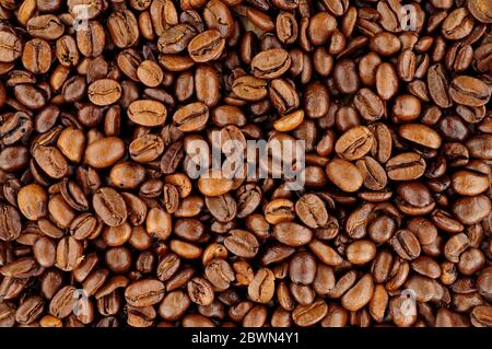 Aromatic fresh roasted coffee bean background texture Stock Photo