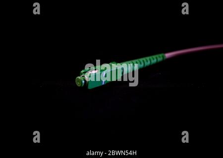 Fiber optic connector to internet at world Stock Photo