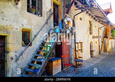 Narrow street by the city wall in Morat (Murten),  Fribourg canton, Switzerland. Stock Photo