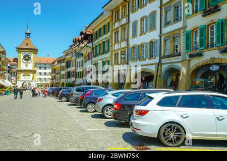 View of famous Bern Gate (Berntor) and Hauptgasse in Murten (Morat). Fribourg canton, Switzerland. Stock Photo