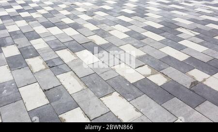 Concrete paving slabs. Abstract gray paving slab texture background. Paving stones of rectangular shape close-up Stock Photo