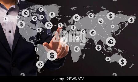 Money Transfers Worldwide. Collage Of Unrecognizable Businessman Pointing On World Map With Currency Icons Network Over Dark Background, Panorama Stock Photo